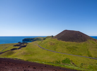 View of the Helgafell volcano from the top of the Eldfell volcano, Heimaey, Vestmannaeyjar islands,...