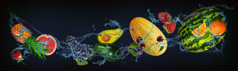 Panorama with fruits in the water - juicy orange, watermelon, strawberry, melon, avocado, grape,...