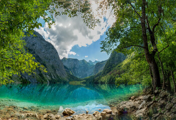 Bavarian Lake view at the Berchtesgaden Obersee which is embedded in pure green nature 