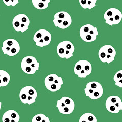 Halloween vector seamless pattern with skulls on the green background