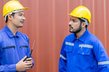 The warehouse attendants are consulting.