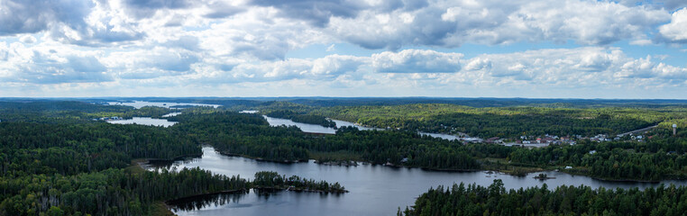 Fototapeta na wymiar A panoramic view of the small town of Temagami, Ontario, and the surrounding area taken from atop the town's fire tower in the White Bear Forest.