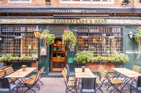 London, UK - August 23, 2022: Facade of Shakespeare's Head, a traditional British London pub built in 1735, one of London's most famous pubs