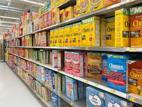 Houston, Texas, USA - February 22, 2022: Different breakfast cereal boxes for sale on the shelves in a store.  