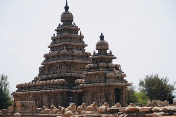 Fototapeta na wymiar Shore temple in Mahabalipuram, Tamilnadu, India. It is one of the Group of Monuments at Mahabalipuram and it has been classified as a UNESCO World Heritage Site. Shore temple is the oldest structure.