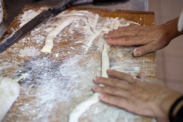 baker kneading dough