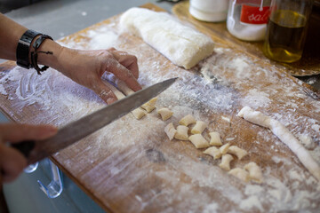 baker kneading dough