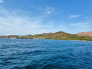 Fototapeta premium Summer landscape blue sea and mountains copy space