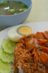 Barbecued red pork in sauce with rice
