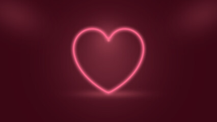 neon light heart shape on red background