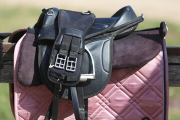 Close up of a sport horse saddle. Quality classical leather saddle
