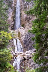 The beautiful three-part Lower Martuljek Waterfall in the Julian Alps, Slovenia. Triglav National Park.