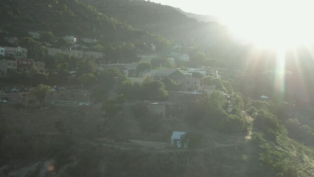 Aerial of small mining town of Jerome, Arizona at sunset