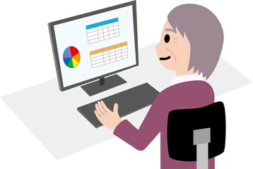 パソコンで事務作業をする初老の女性
