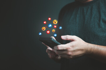 Man using smartphone and chatting in social media app. Social gathering technology and digital online marketing concept. Social distancing and working from home theme. Global communication phone