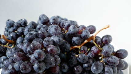 grape on a white plate