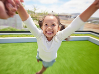 Girl child happy, parent pov of fun outdoor in garden and parent hand swinging kid by arms in circle movement. Family play game on green grass landscape park, young happiness and kids funny smile - obrazy, fototapety, plakaty
