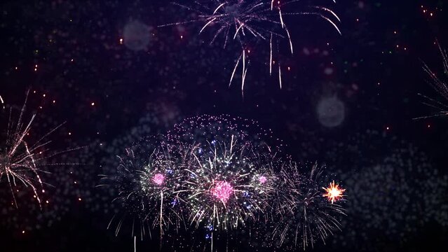 4K Shining Fireworks Display Explosion with bokeh lights in night sky Loop Animation Background. Birthday, Anniversary, Celebration, Holiday, new year, Party, Invitation, Christmas, festival, greeting