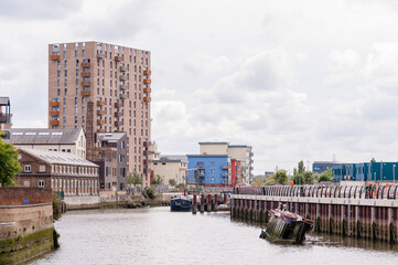 Fototapeta na wymiar London, England, UK - September 04, 2022: New apartment complex along the Roding Riverside in Barking, East London, UK