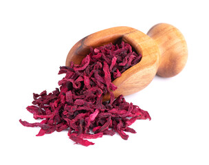 Dry beetroot in wooden scoop, isolated on the white background. Chopped dried beet.