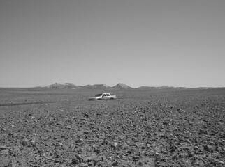 Journey by car through moonscape