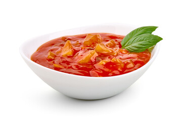 Hungarian lecho of tomatoes and sweet paprika, isolated on white background.