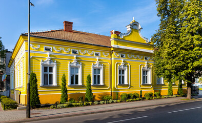 Fototapeta premium Historic Dom Kultury Cultural Center building hosting Vistula Cinema in old town quarter of historic center of Tarnobrzeg in Poland