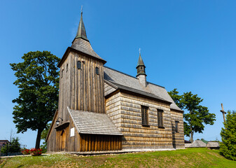 Fototapeta na wymiar Historic XVII century wooden church of Our Lord Transfiguration in Cmolas village near Mielec in Podkarpacie region of Poland