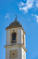 Fototapeta na wymiar A brick roof bell tower in Portugal