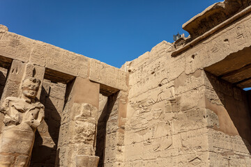 Different hieroglyphs on the walls and columns in the Karnak temple. Karnak temple is the largest...