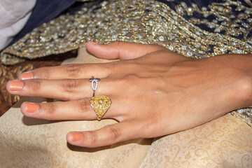 Golden ring of a Asian bride in the Thar desert