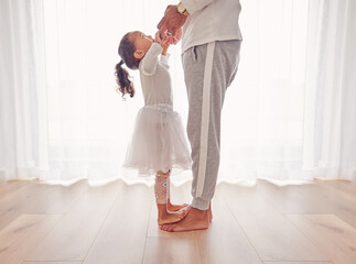Family, dance and daughter on dad feet together on floor of interior for happiness, childhood and...