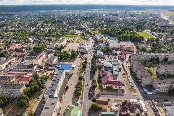 aerial panoramic view from a great height of a small provincial town with a private sector and high-rise apartment buildings