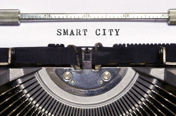 Text "smart city" written with a typewriter