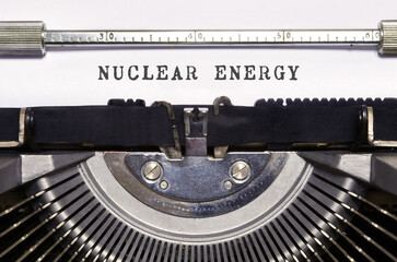 Text "nuclear energy" written with a typewriter