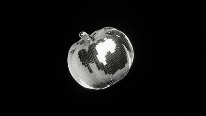 Disco ball in the shape of a pumpkin on black background