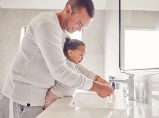 Children, cleaning and family with a man and girl washing their hands in the bathroom at home together. Kids, water and hygiene with a father teaching his daughter about clean and healthy living