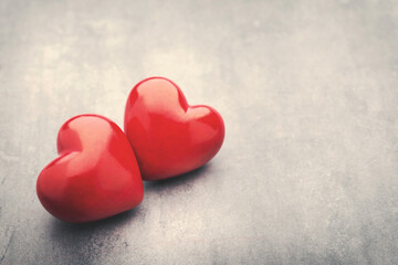 Fototapeta premium Red heart on the gray metal background.