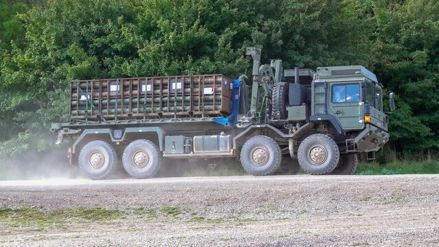 a supply laden British army MAN HX77 8x8 in action on a military exercise