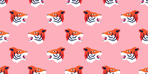 Seamless pattern with funny crazy cartoon tiger heads on pink background vector illustration