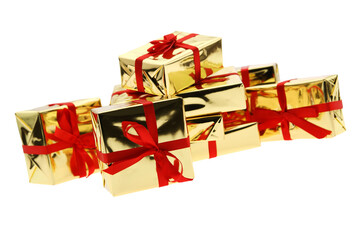 Shiny gold wrapped gifts with red ribbon  isolated on transparency photo png file 