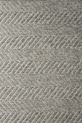 Fabric background. Sticky textured gray fabric with pattern close up. Fabric for the manufacture of fabric blinds or mat, wallpaper