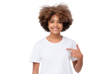 African student girl pointing with index finger at blank white t-shirt with empty space for your advertising text or image, standing isolated