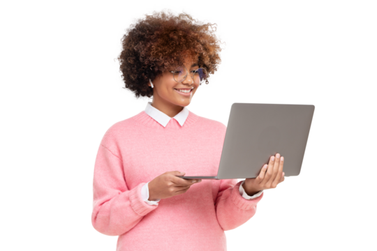 Studio portrait of smiling african american teen girl, high school or online course student holding laptop