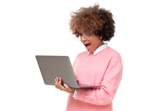 Studio portrait of surprised african american student teen girl, holding laptop with wow emotion, isolated