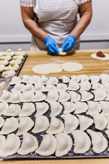 The process of preparing food from dough in the kitchen