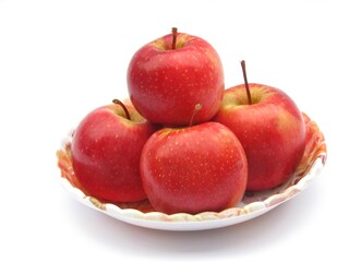 Red apples in a plate 