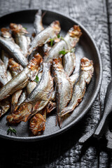 Healthy smoked sprats as a healthy snack.