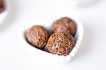 Three brigadiers in a heart-shaped bowl