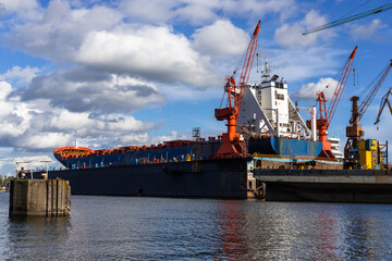 View of the ship being renovated in a dry dock in the Gdansk shipyard